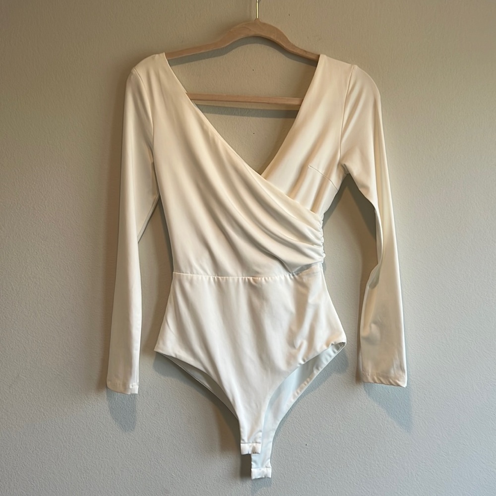 Beginning Boutique low v neck bodysuit